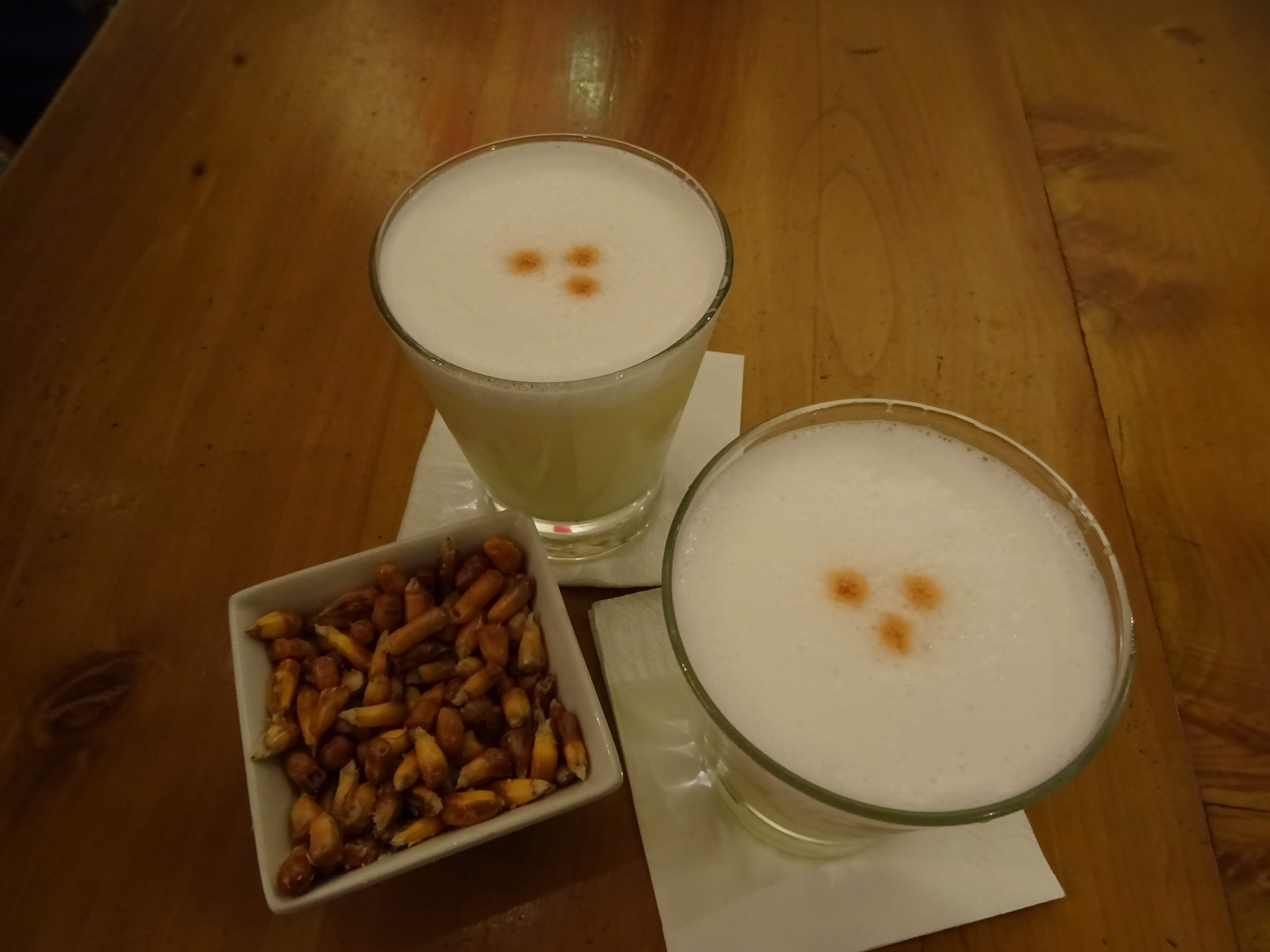 Well made Pisco sour and corns